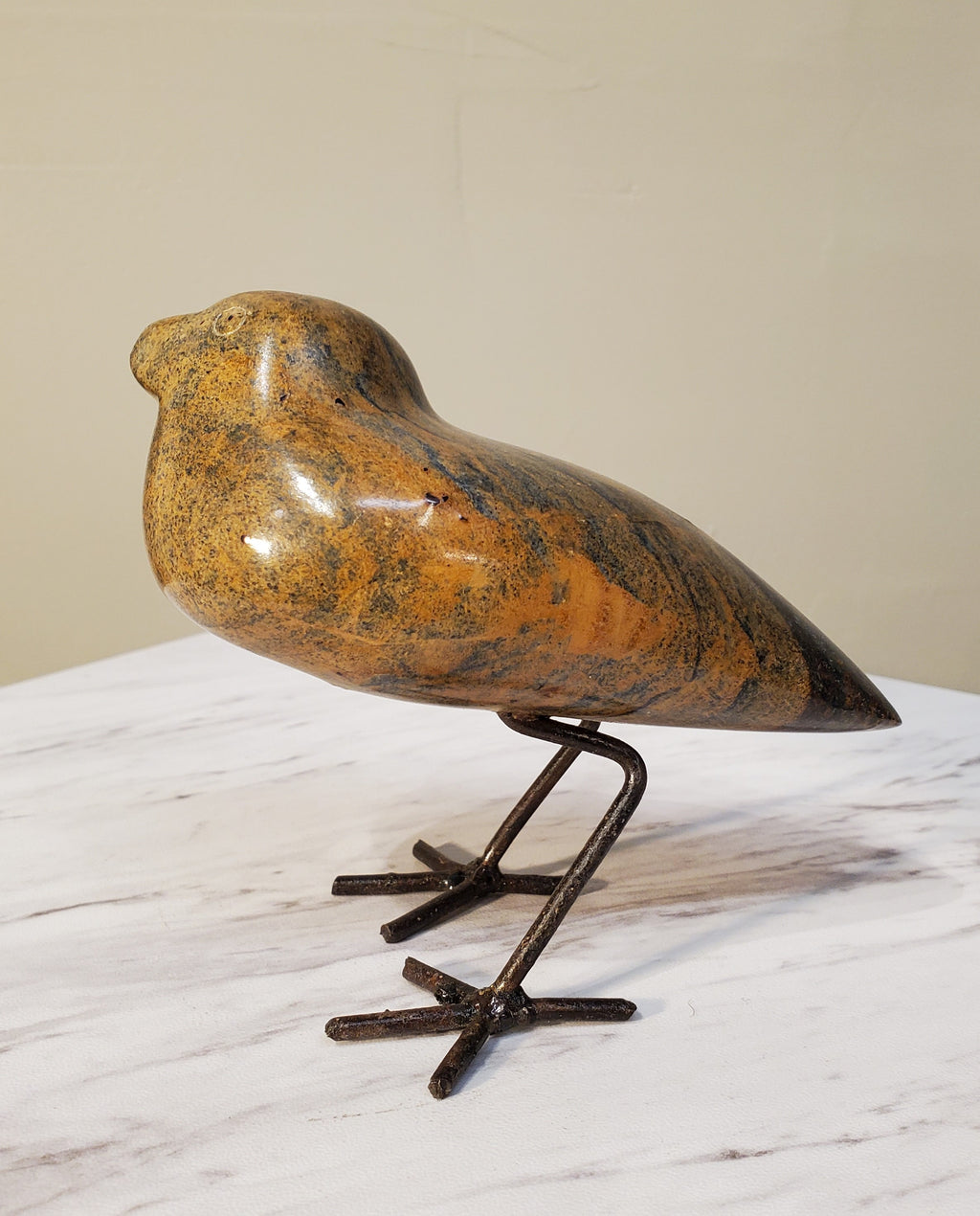 Curious Bird. Color Range: Orange, Blue, Brown, Black. 