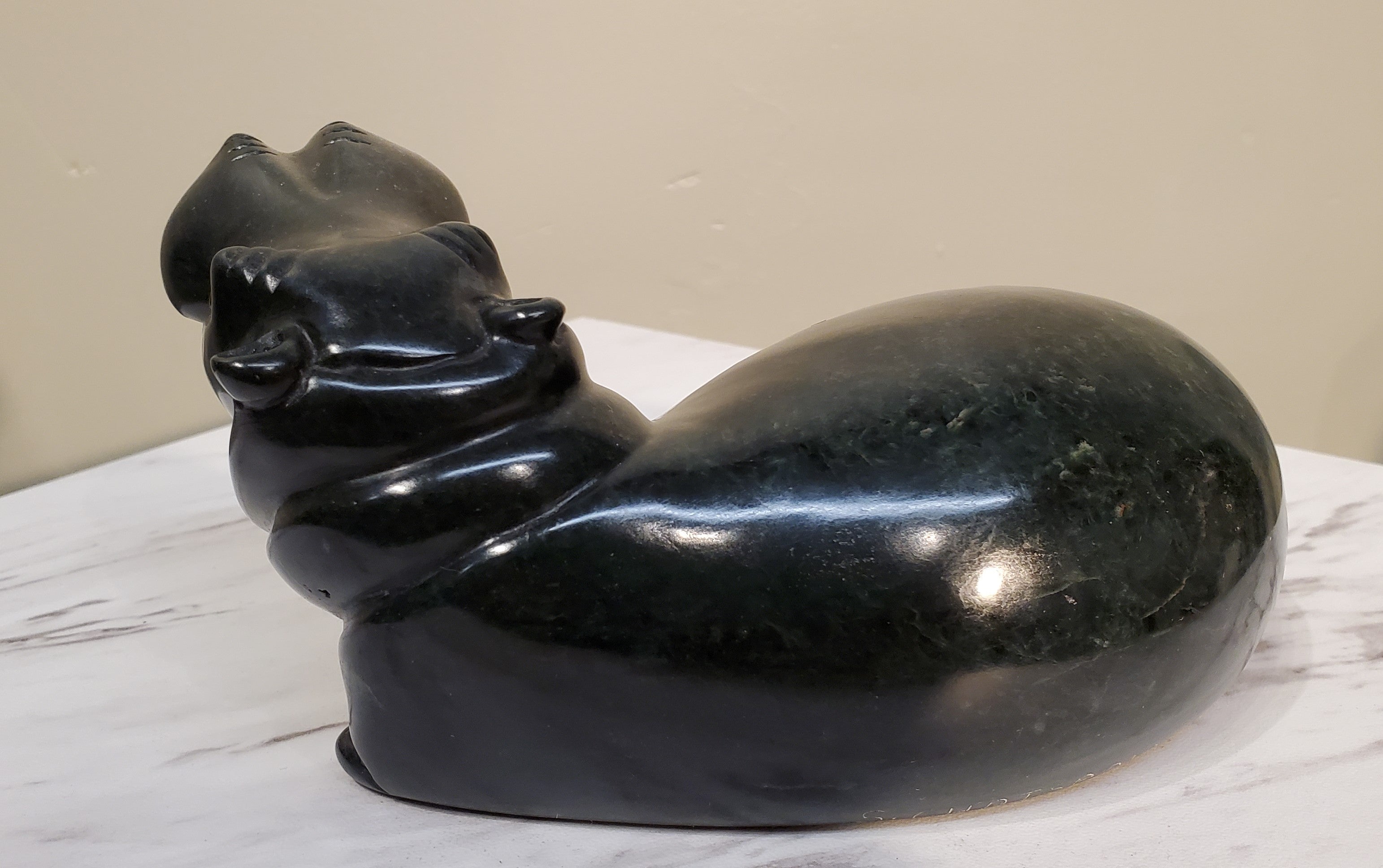 Lounging Hippo. Color Range: Black.