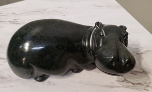 Lounging Hippo. Color Range: Black.