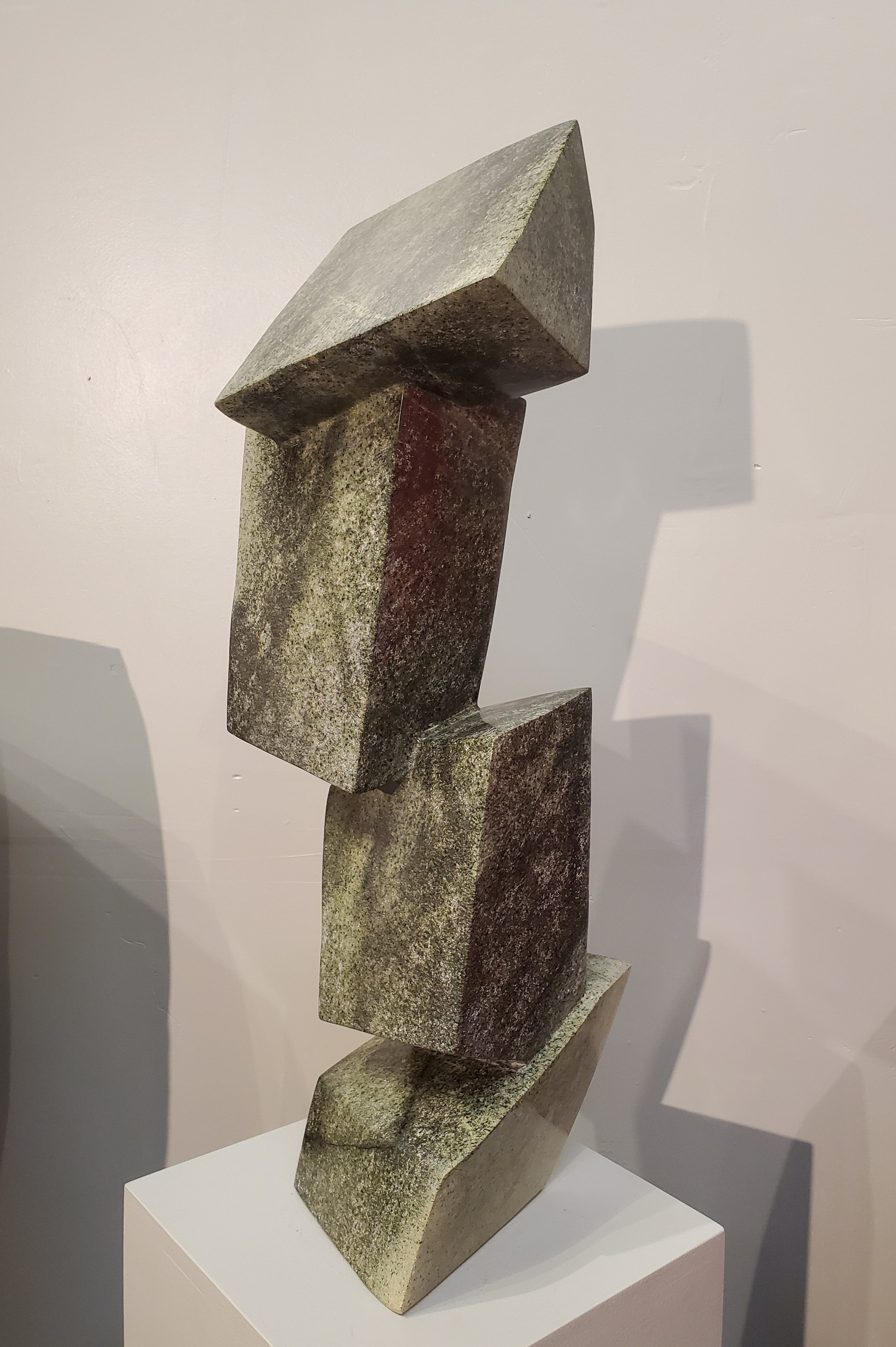 Balancing Act. Color Range: Green, Black, Cream.