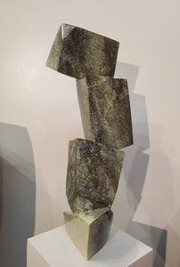 Balancing Act. Color Range: Green, Black, Cream.