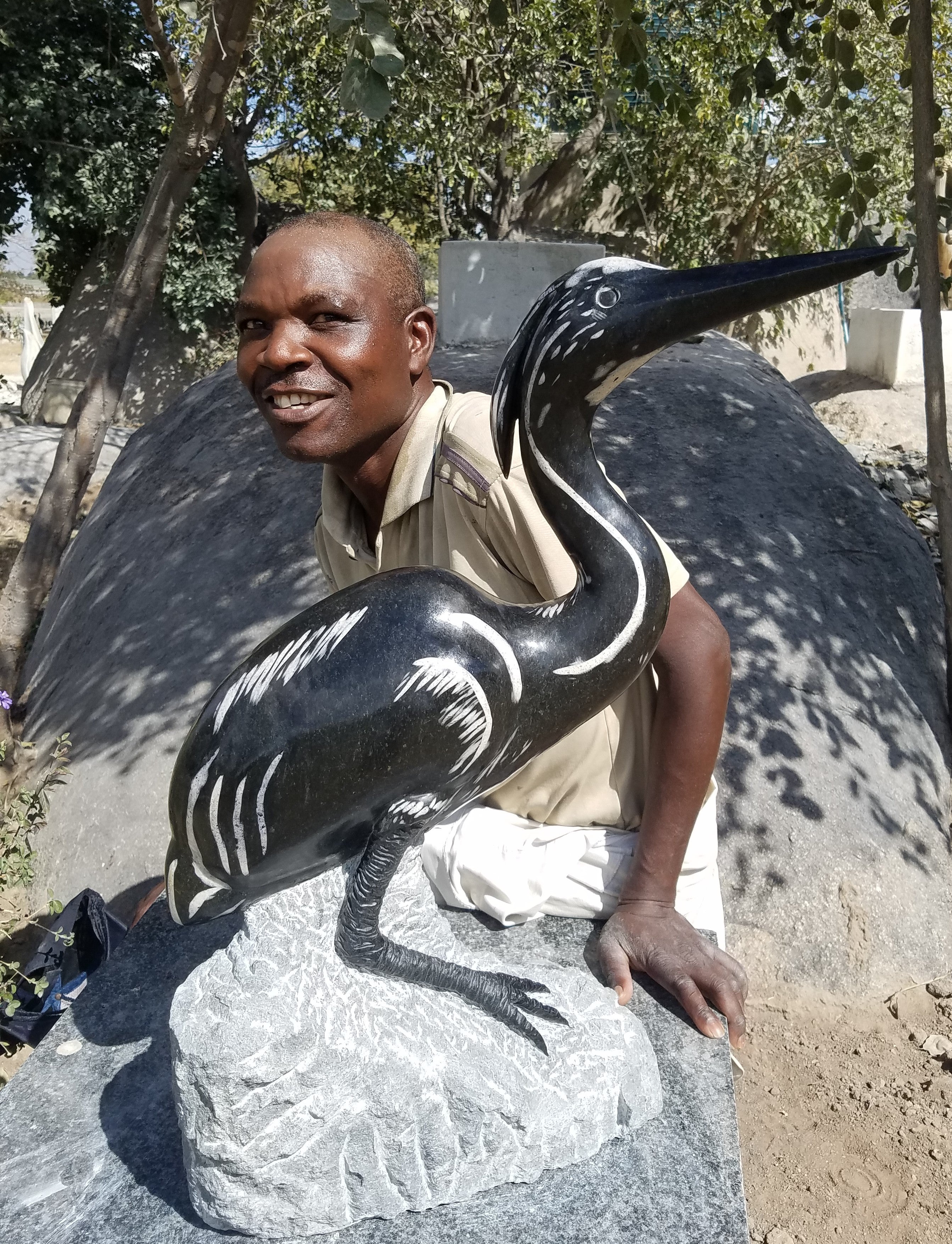 Artist Shephard Deve with Heron
