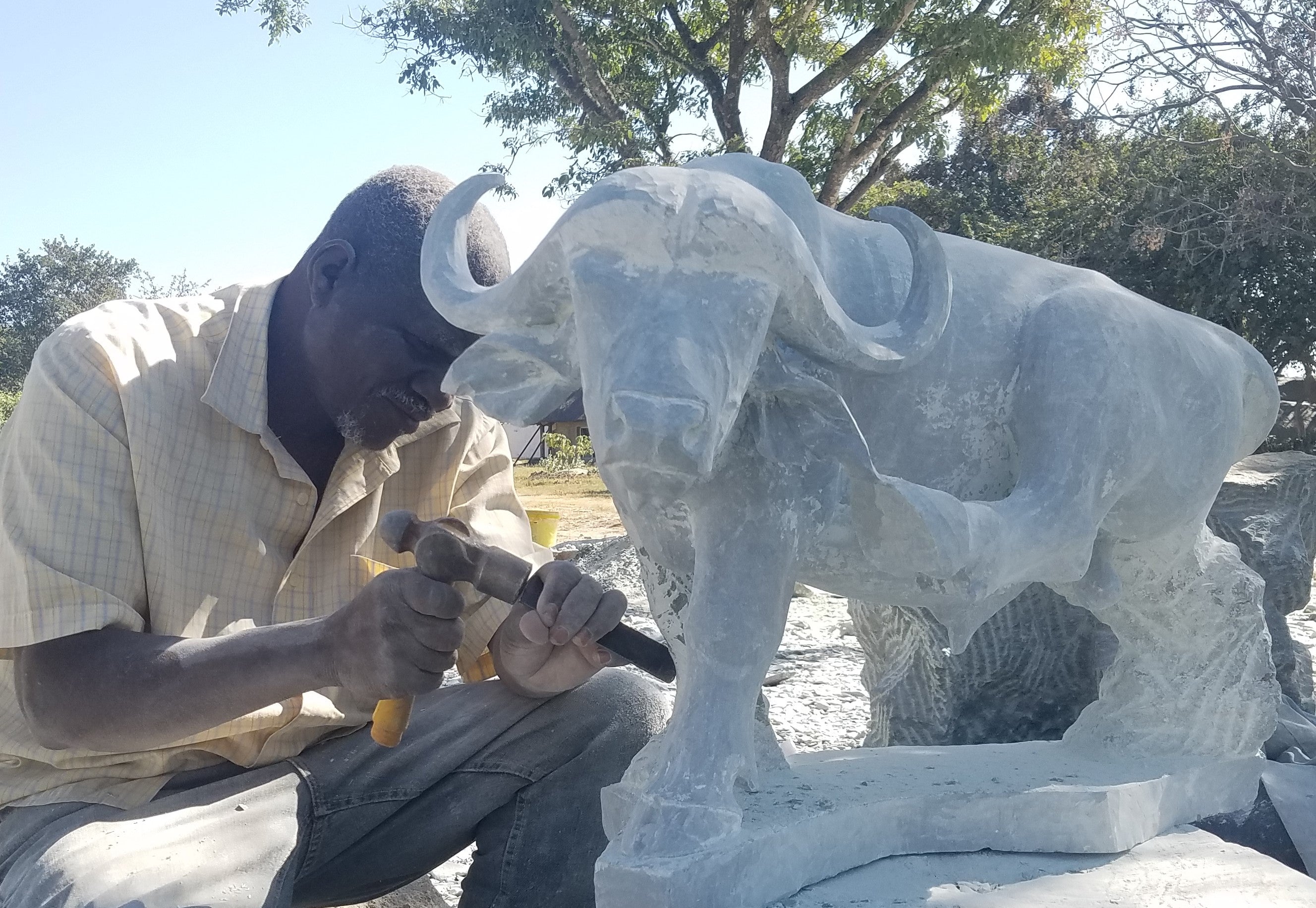 Artist Taurai Maisiri at work. 